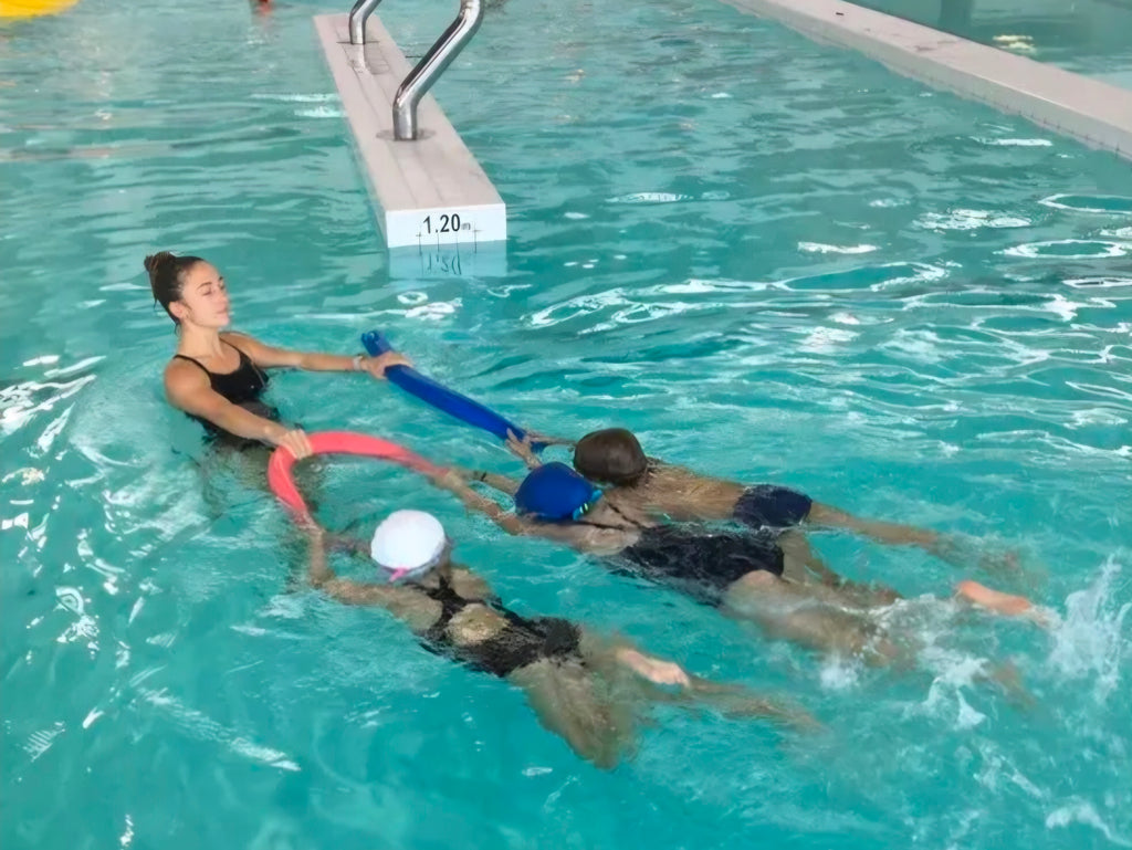 Coaching collectif de natation en piscine