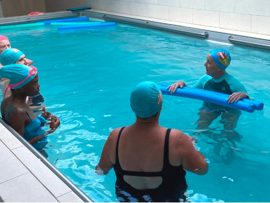 Coaching collectif de natation en piscine
